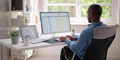 Data,Analyst,African,Man,Using,Spreadsheet,On,Computer